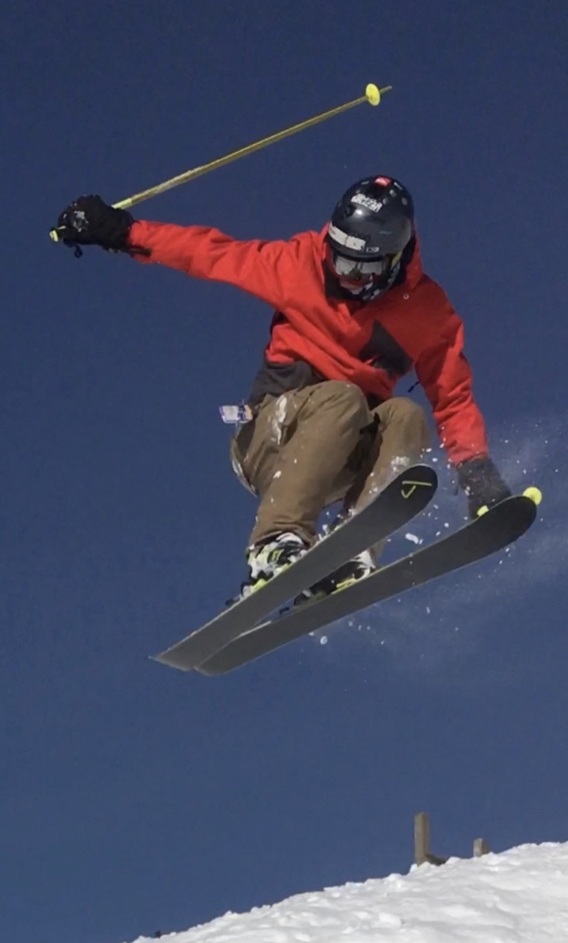 Skier doing a sideway jump