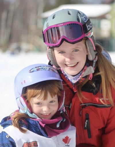 Image-13 Ski instructor posing with a student