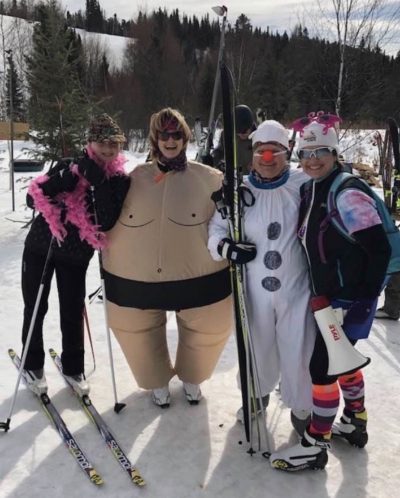 Skiers in costumes